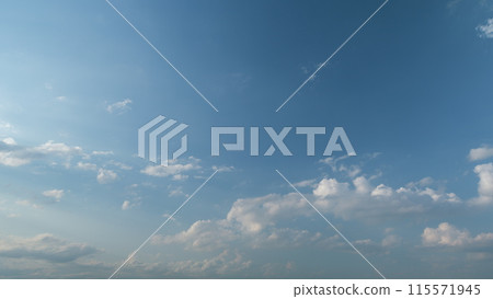 Tropical summer sunlight. Blue sky with cumulus and stratocumulus clouds. Fluffy layered clouds sky atmosphere. Timelapse. Tropical summer sunlight. Blue sky with cumulus and stratocumulus clouds. Fluffy layered clouds sky atmosphere. Timelapse. 115571945