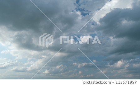 Beautiful dark dramatic sky with stormy clouds before rain or snow. Thunderstorm heaven landscape. Timelapse. Beautiful dark dramatic sky with stormy clouds before rain or snow. Thunderstorm heaven landscape. Timelapse. 115571957