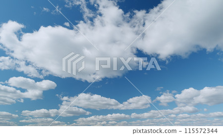 White and blue colors sky with stratus and stratocumulus clouds. Weather was very hot in the evening. Tropical summer sunlight. Timelapse. White and blue colors sky with stratus and stratocumulus clouds. Weather was very hot in the evening. Tropical summer sunlight. Timelapse. 115572344