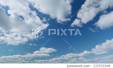 White stratocumulus and stratus cloudscape on beautiful sunny clear sky. Tropical summer sunlight. Timelapse. White stratocumulus and stratus cloudscape on beautiful sunny clear sky. Tropical summer sunlight. Timelapse. 115572349