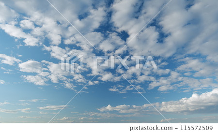 Beautiful blue sky with cumulus and cirrocumulus on different layers clouds background. Sky with clouds weather nature cloud blue. Timelapse. Beautiful blue sky with cumulus and cirrocumulus on different layers clouds background. Sky with clouds weather nature cloud blue. Timelapse. 115572509