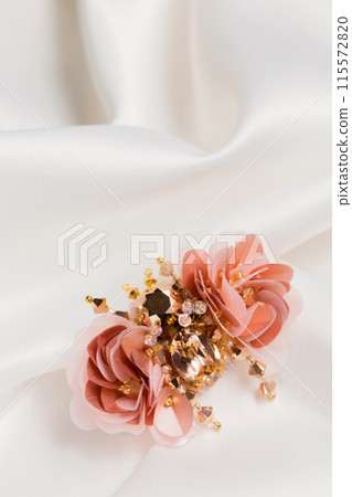 Decorative handmade brooch in the shape of a beetle on silk fabric Decorative handmade brooch in the shape of a beetle on silk fabric 115572820