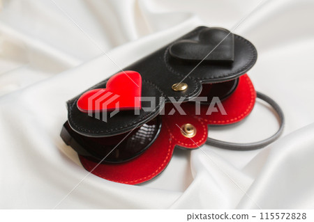 glasses in a case on a white background glasses in a case on a white background 115572828