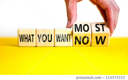 What you want now or most symbol. Concept word What you want now or most on cubes. Beautiful white background. Psychologist hand. Psychological what you want now or most concept. Copy space. What you want now or most symbol. Concept word What you want now or most on cubes. Beautiful white background. Psychologist hand. Psychological what you want now or most concept. Copy space. 115573153