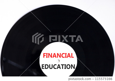 Financial education symbol. Concept words Financial education on beautiful white black vinyl disk. Beautiful white paper background. Business Financial education concept. Copy space. Financial education symbol. Concept words Financial education on beautiful white black vinyl disk. Beautiful white paper background. Business Financial education concept. Copy space. 115573166