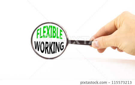 Flexible working symbol. Concept words Flexible working in beautiful magnifying glass. Beautiful white paper background. Businessman hand. Business flexible working concept. Copy space. 115573213