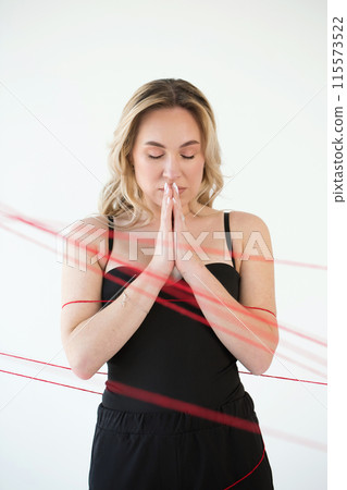 An adult woman with red threads. An adult woman with red threads. 115573522