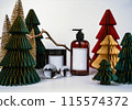 dark jar with lid and dispenser on the background of Christmas decorations, side view 115574372