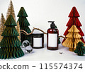 dark jar with lid and dispenser on the background of Christmas decorations, side view 115574374