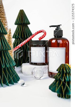 dark jar with lid and dispenser on the background of Christmas decorations, side view 115574375