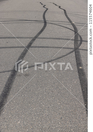 tire tracks during dangerous driving on the road 115574604