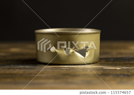 an empty can with a lot of damage 115574657
