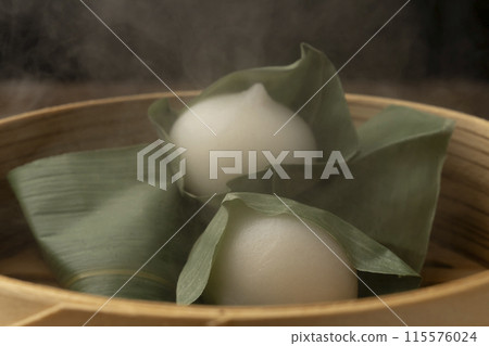 Sasamanju steamed in a bamboo steamer Sasamanju steamed in a bamboo steamer 115576024