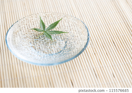 Blue maple floating on the water 115576685