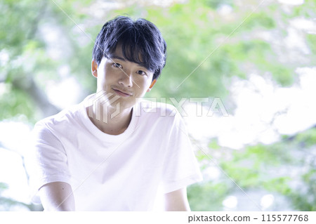 Young man in white T-shirt 115577768