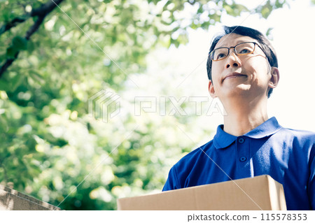 Delivery man male with baggage Delivery man male with baggage 115578353