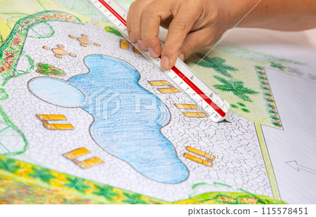 Landscape architect student learning garden plan design by hand drawing. Landscape architect student learning garden plan design by hand drawing. 115578451