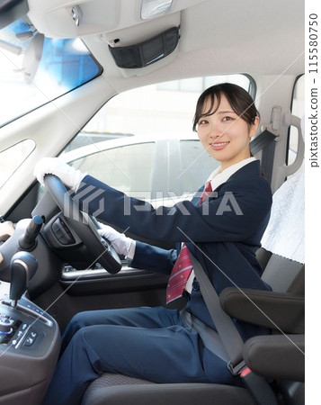 Smiling female driver/taxi driver image Smiling female driver/taxi driver image 115580750