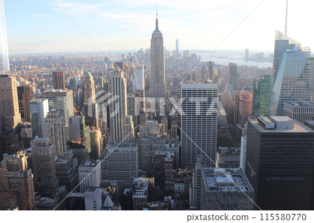 Panorama of New York City, view from the Rockefeller Center observation deck. On the Sunset. Empire State Building view Panorama of New York City, view from the Rockefeller Center observation deck. On the Sunset. Empire State Building view 115580770
