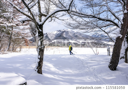 Walking in the snow on snowshoes in the Hiruzen Plateau Walking in the snow on snowshoes in the Hiruzen Plateau 115581050