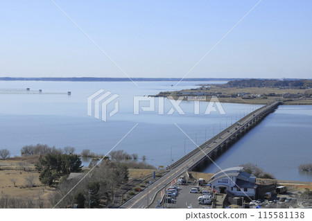 The Kasumigaura Bridge over Lake Kasumigaura, as seen from the observation deck of the 60m-tall Rainbow Tower, located on the shores of Lake Kasumigaura in Namegata City, Ibaraki Prefecture. 115581138