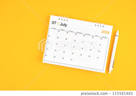 July 2024, Monthly desk calendar for 2024 year and pen on yellow background. 115581483