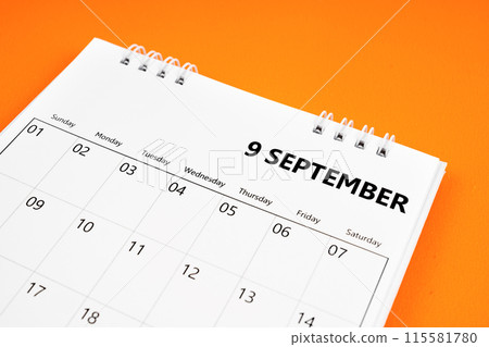 September 2024 month calendar on orange color cover background. 115581780