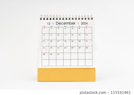 2024 December monthly desk calendar isolated on white. 2024 December monthly desk calendar isolated on white. 115581961