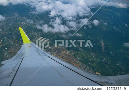 Kumamoto cityscape as seen from an airplane Kumamoto cityscape as seen from an airplane 115583849