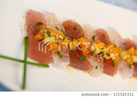 FISH CEVICHE RECIPE, SEA BREAM AND TUNA, AVOCADO, BELL PEPPER, CHILLI, CHIVES, LEMON, OLIVE OIL 115585352