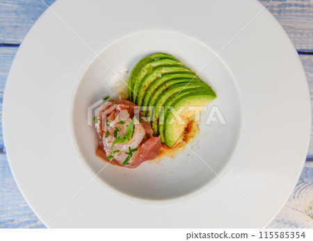 FISH CEVICHE RECIPE, SEA BREAM AND TUNA, AVOCADO, BELL PEPPER, CHILLI, CHIVES, LEMON, OLIVE OIL FISH CEVICHE RECIPE, SEA BREAM AND TUNA, AVOCADO, BELL PEPPER, CHILLI, CHIVES, LEMON, OLIVE OIL 115585354