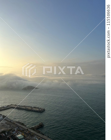 Flying Buddha in the Summer Sky Hong Kong 115586636