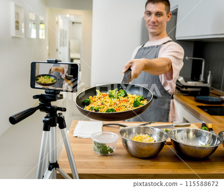 The chef is broadcasting live from workshop how to prepare a vegetarian food 115588672