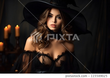 Glamorous witch in dark lingerie with a black hat, candles, creating a mystical atmosphere 115589025