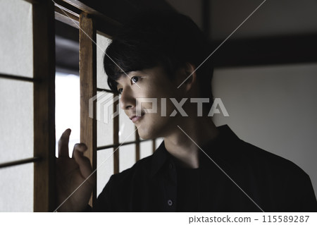 A man on stakeout 115589287