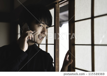 A man on stakeout 115589369