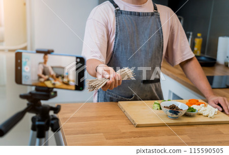 The chef is broadcasting live from workshop how to prepare a buckwheat pasta with lentils 115590505