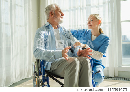 Help support retirement healthcare. Nurse helping old man in wheelchair. Patient and woman in nursing home for medical caregiver. Nurse taking care of paralyzed man in chair for people with disability 115591675