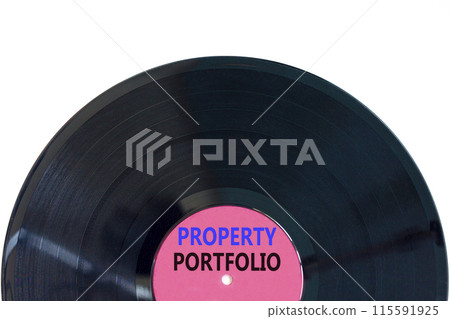 Property portfolio symbol. Concept words Property portfolio on beautiful purple black vinyl disk. Beautiful white paper background. Business Property portfolio concept. Copy space. Property portfolio symbol. Concept words Property portfolio on beautiful purple black vinyl disk. Beautiful white paper background. Business Property portfolio concept. Copy space. 115591925