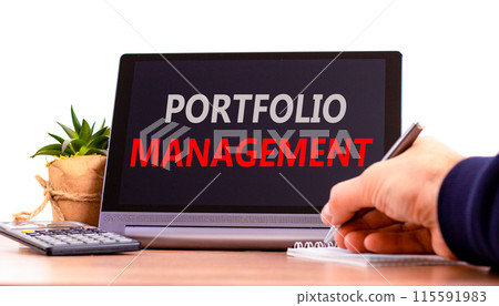 Portfolio management symbol. Concept words Portfolio management on beautiful black pad. Beautiful white background. Businessman hand. Calculator. Business Portfolio management concept. Copy space. Portfolio management symbol. Concept words Portfolio management on beautiful black pad. Beautiful white background. Businessman hand. Calculator. Business Portfolio management concept. Copy space. 115591983