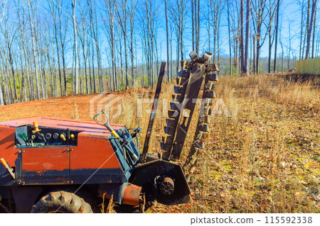 It is trencher cable plow tractor that is used to lay fiber optic cables It is trencher cable plow tractor that is used to lay fiber optic cables 115592338