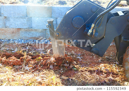 An optical fiber cable is laid with aid of trencher cable plow tractor An optical fiber cable is laid with aid of trencher cable plow tractor 115592349