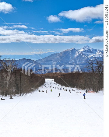 A ski resort in Kitashiobara Village, Fukushima Prefecture. View of Mount Bandai from the main street. 115593243