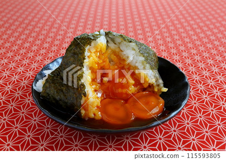 Egg yolk rice ball on a Japanese pattern background Egg yolk rice ball on a Japanese pattern background 115593805
