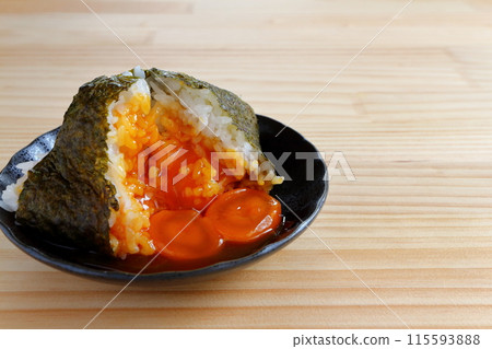 Egg yolk rice ball on table background Egg yolk rice ball on table background 115593888