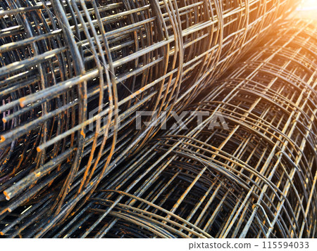 Metal bars arranged stack at the construction site 115594033