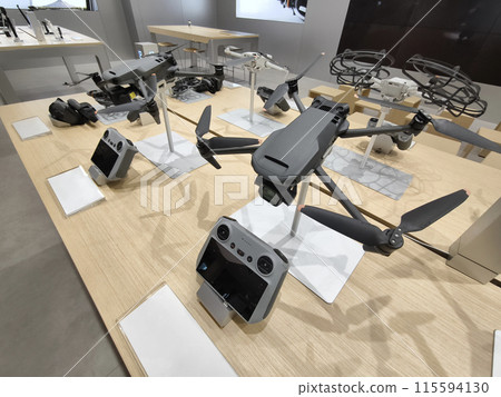 Modern drone for video and photo in the light store Modern drone for video and photo in the light store 115594130