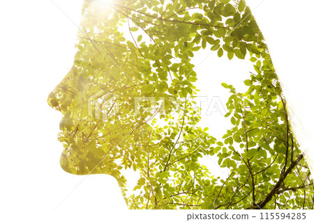 A radiant double exposure profile portrait silhouette of a woman A radiant double exposure profile portrait silhouette of a woman 115594285