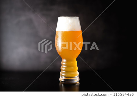 Image of American craft beer: Hazy IPA in an IPA glass 115594456