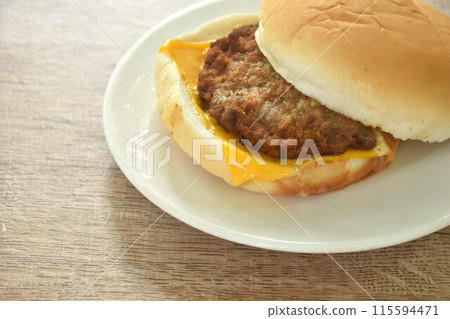 fried mashed beef cheese hamburger stuffed mayonnaise sauce with ketchup on plate   115594471